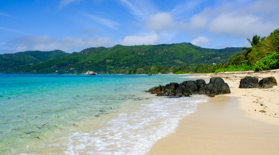 Searching for seashells on the seashores of the Seychelles