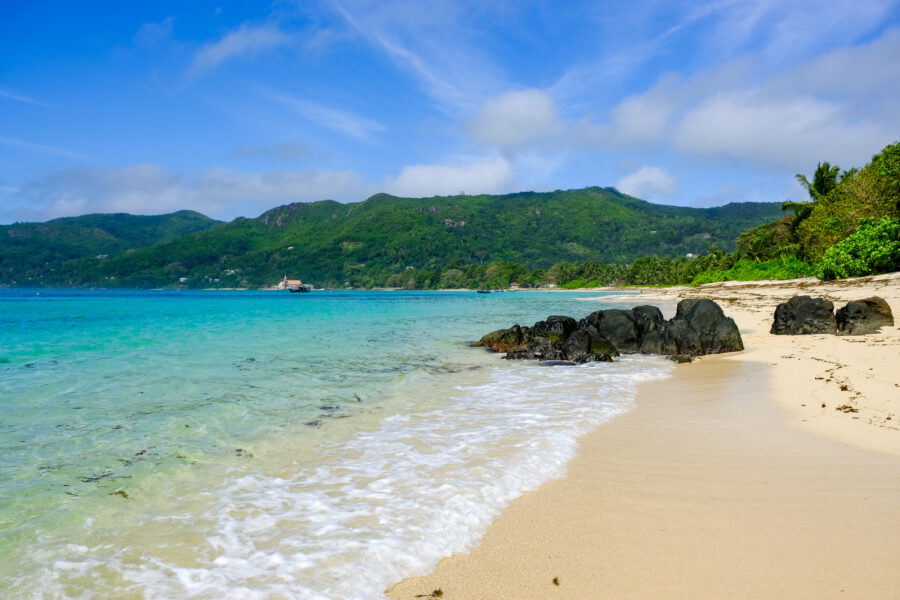 Searching for seashells on the seashores of the Seychelles